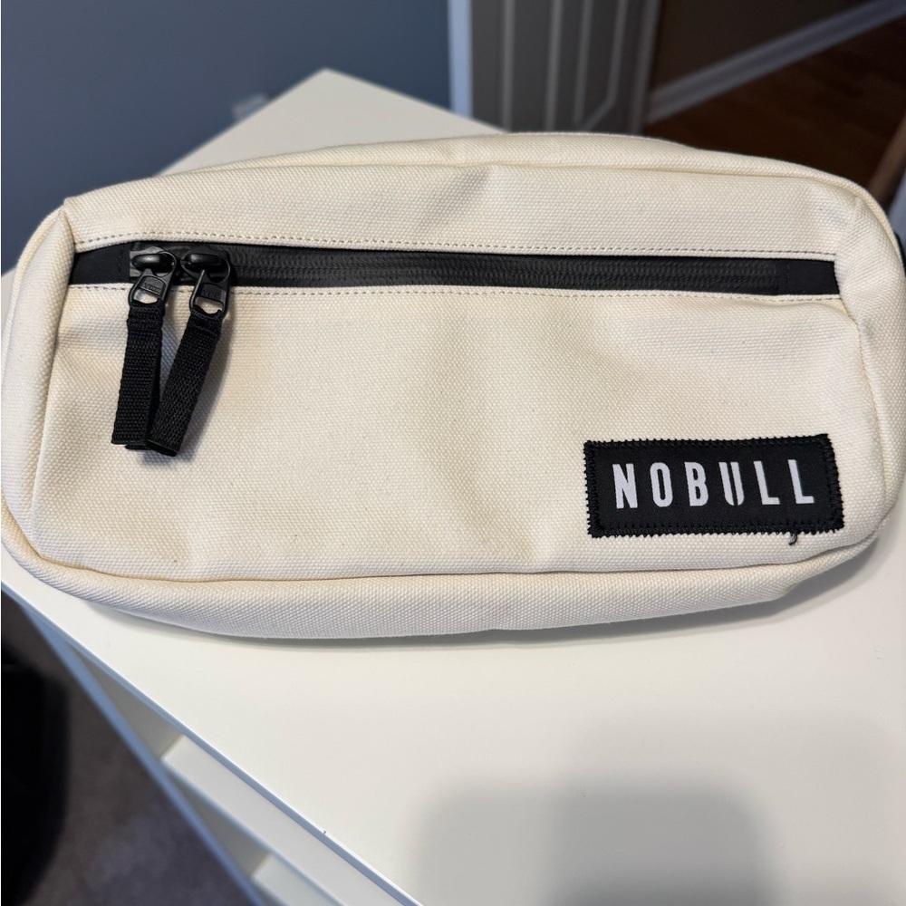 NOBULL Cream and Black Belt Bag Minimalist Design